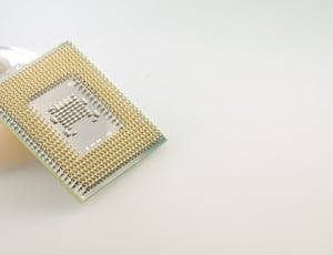 yellow computer processor with white background thumbnail