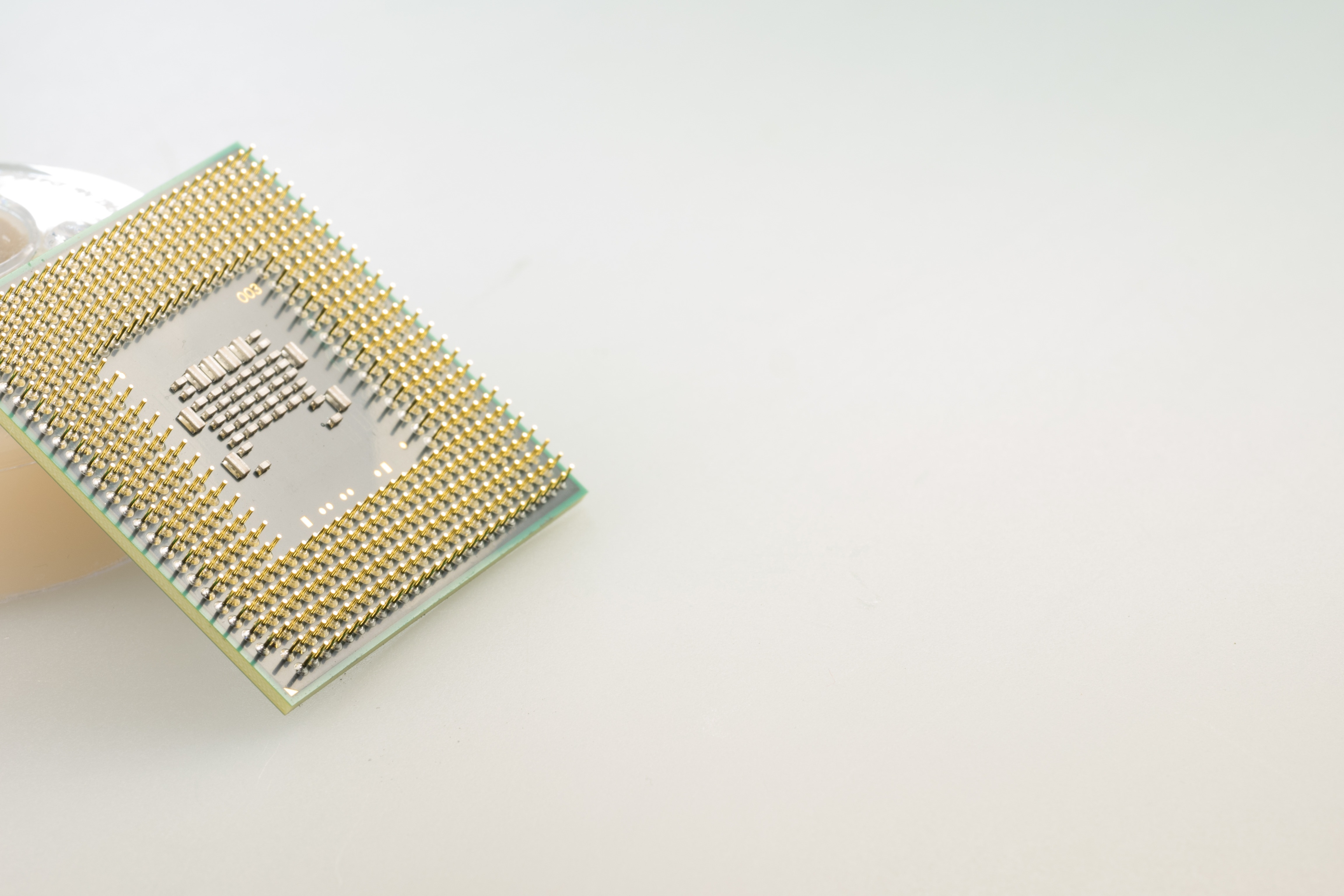 yellow computer processor with white background