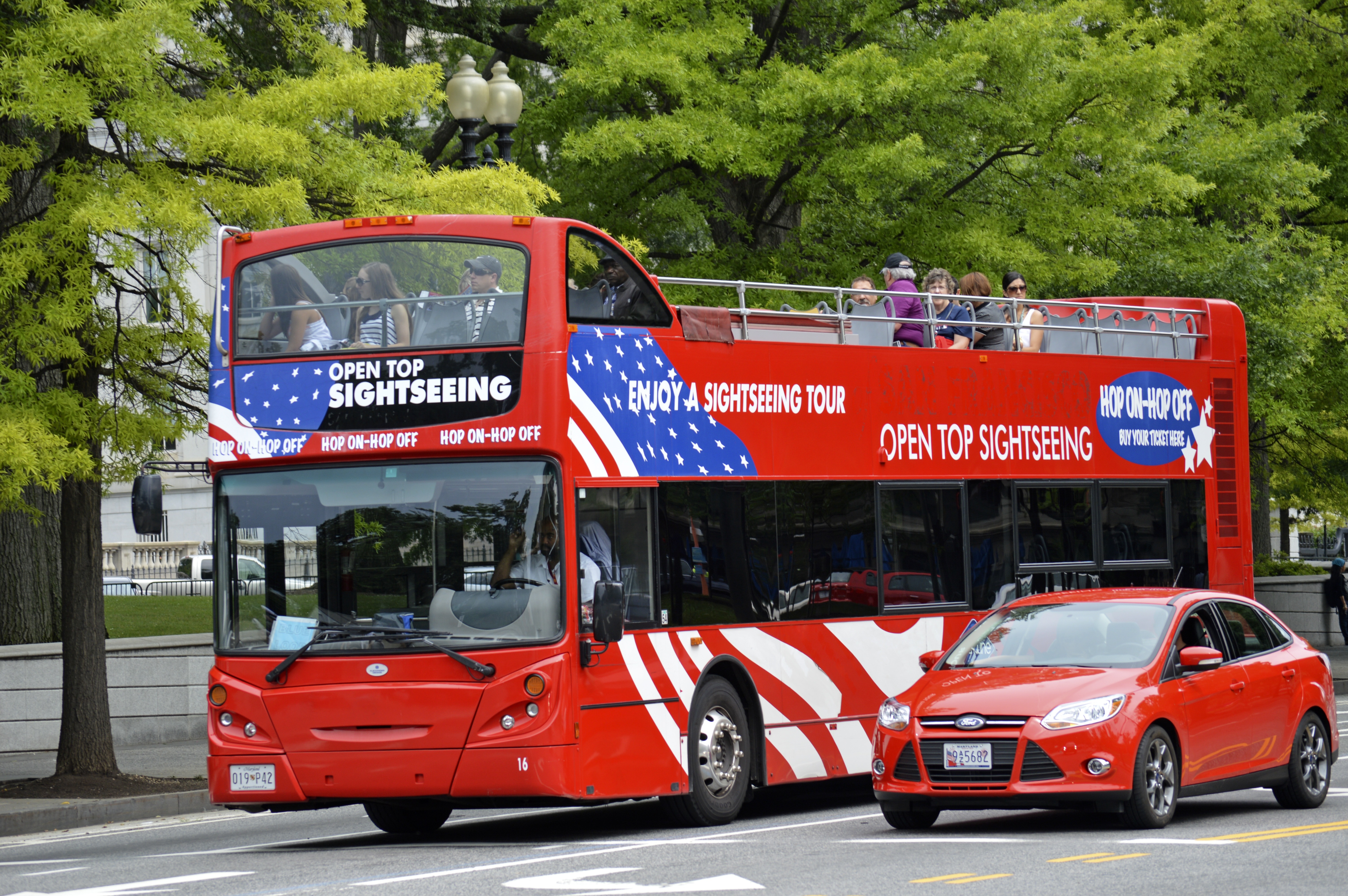 red white and blue 2 floor bus