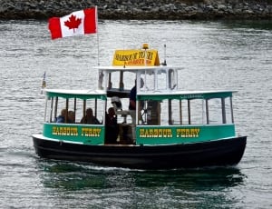 green and black canada flag boat thumbnail