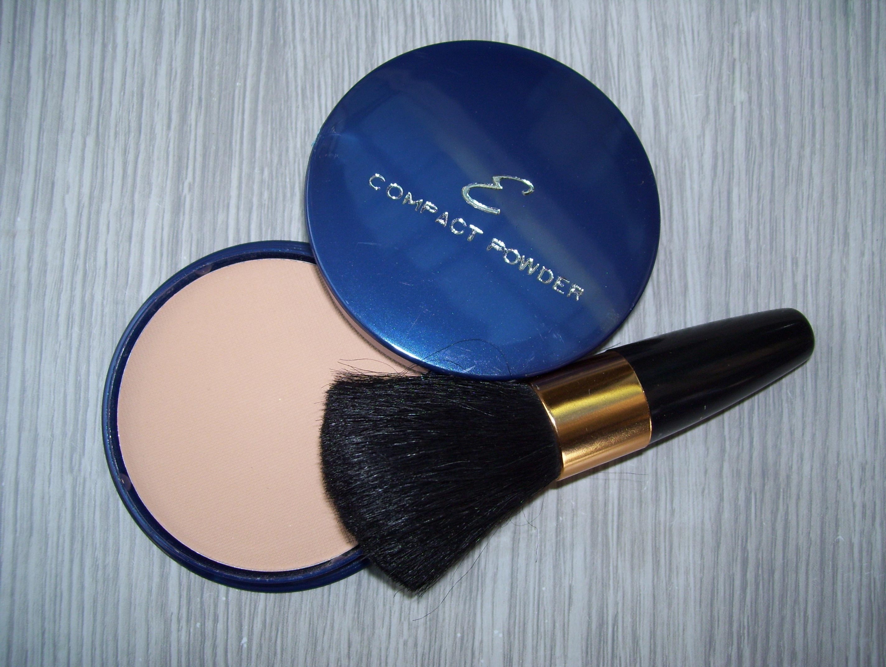 compact powder blush on and  makeup brush