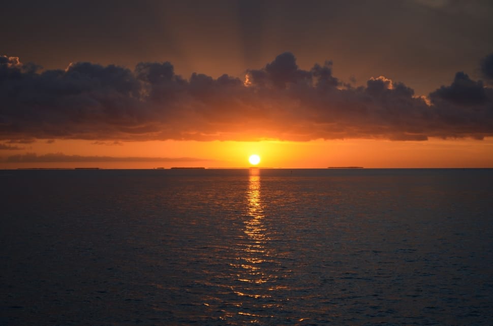 photography of sunset in sea preview