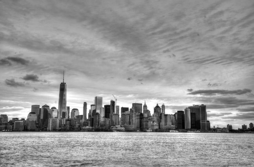 grayscale photography of a city of high rise building preview