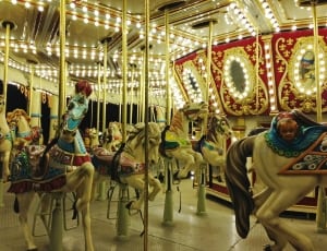 brown red and beige horse carousel thumbnail