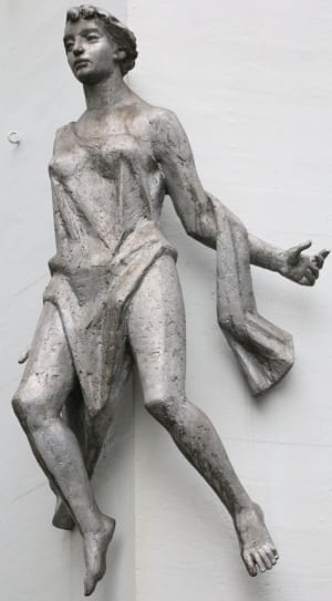 gray concrete statue of woman thumbnail