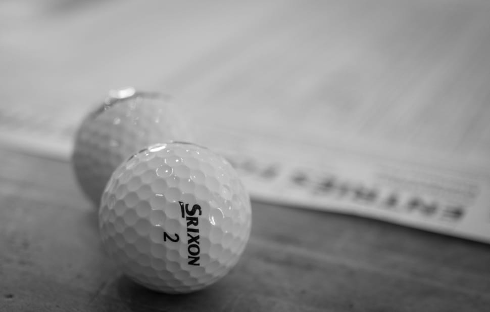 2 white srixon 2 golf balls free image - Peakpx