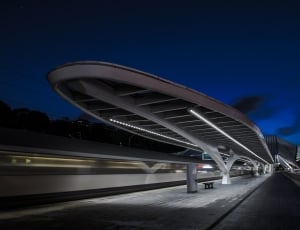 time lapse photography of train station thumbnail