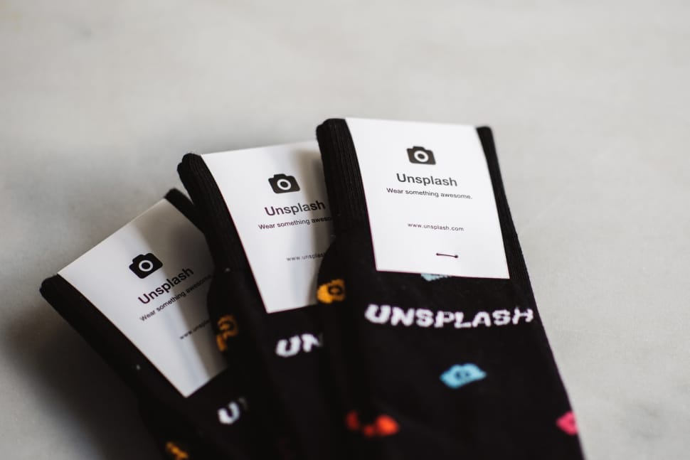 three paired of black  unplash socks preview