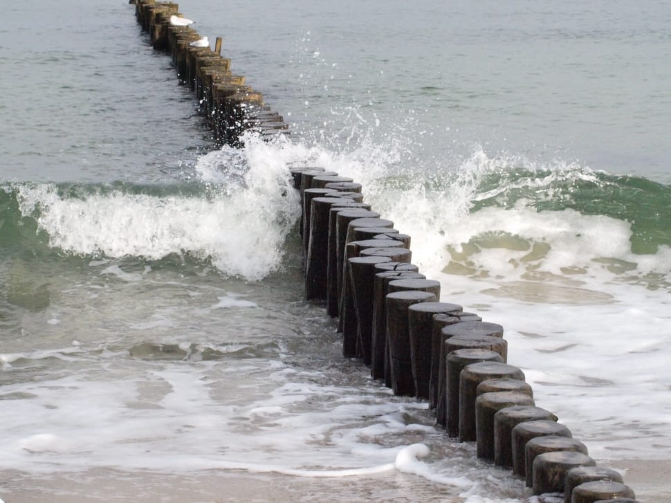 rock jetty ocean waves preview