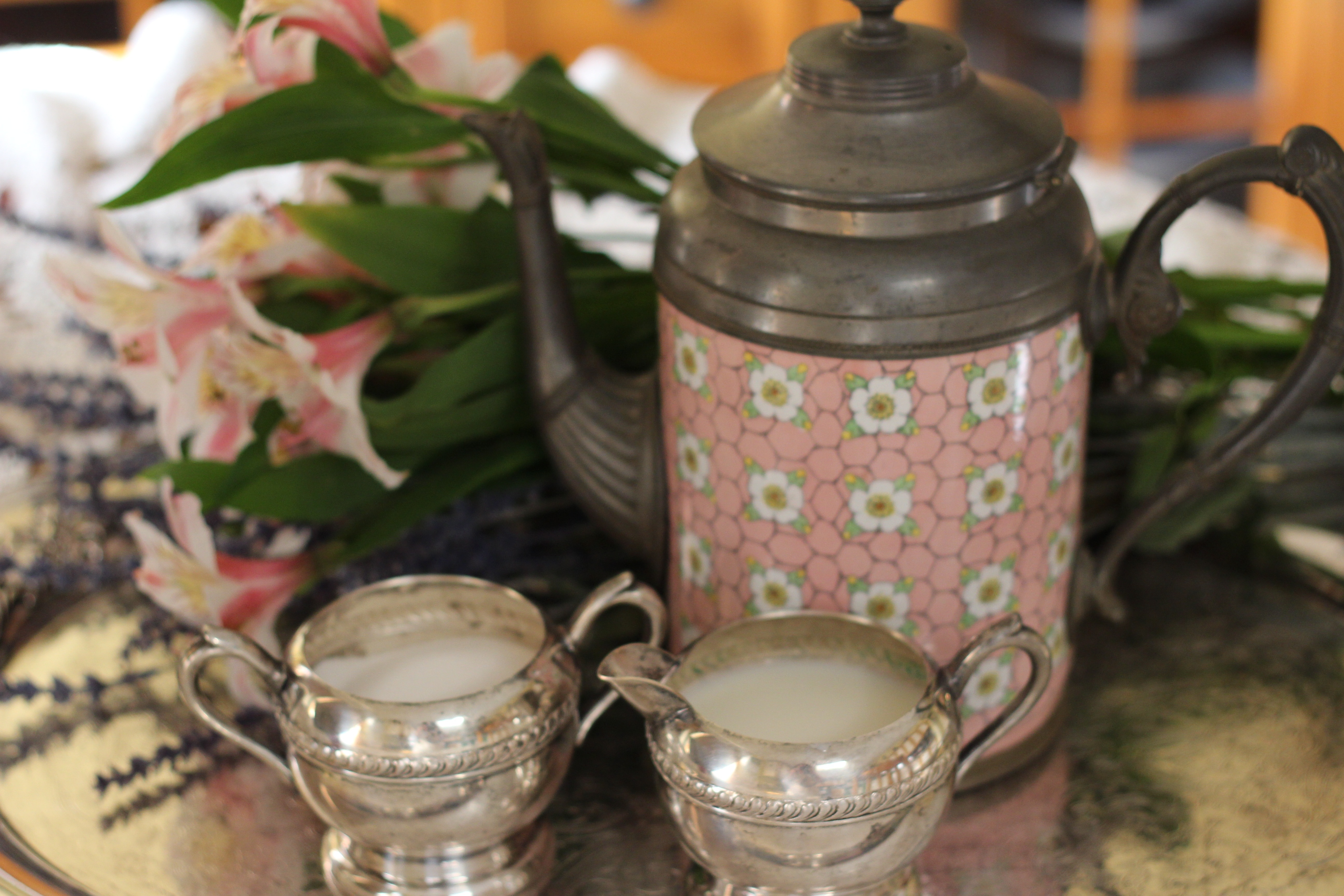two silver steel arabic teacups
