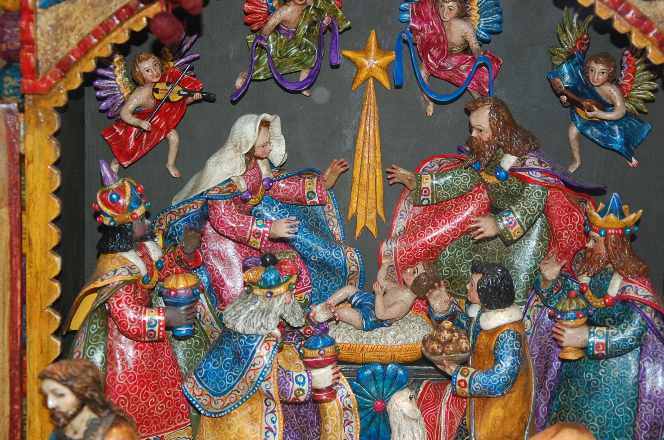 red blue and yellow multicolored the nativity figurine