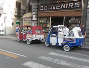 blue and white and red and white rickshaws thumbnail