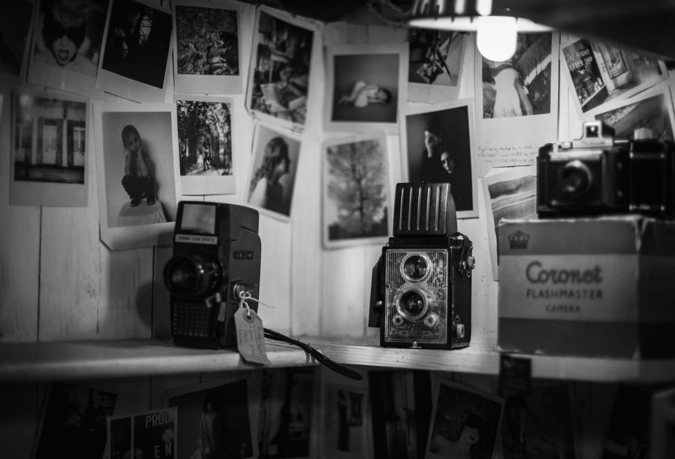 grayscale photo of vintage cameras preview