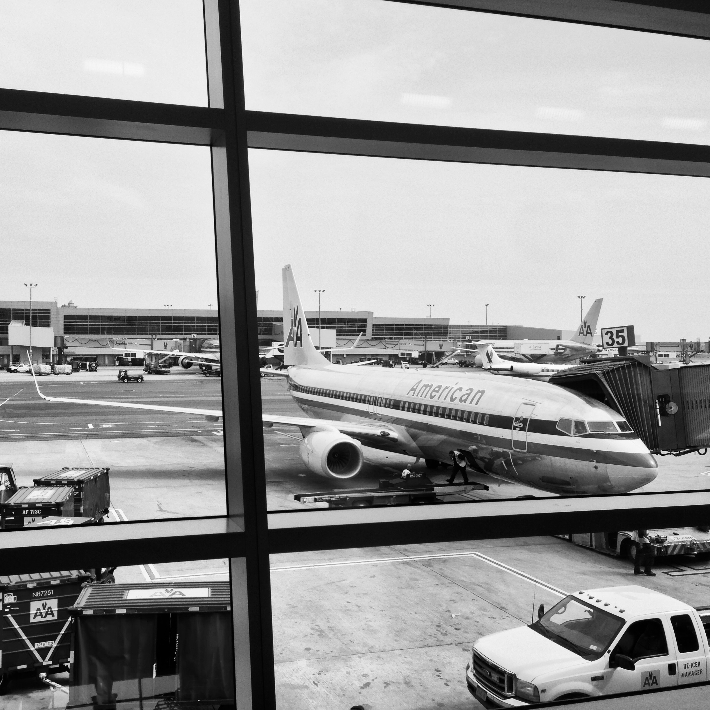gray scale photo of america print airplane
