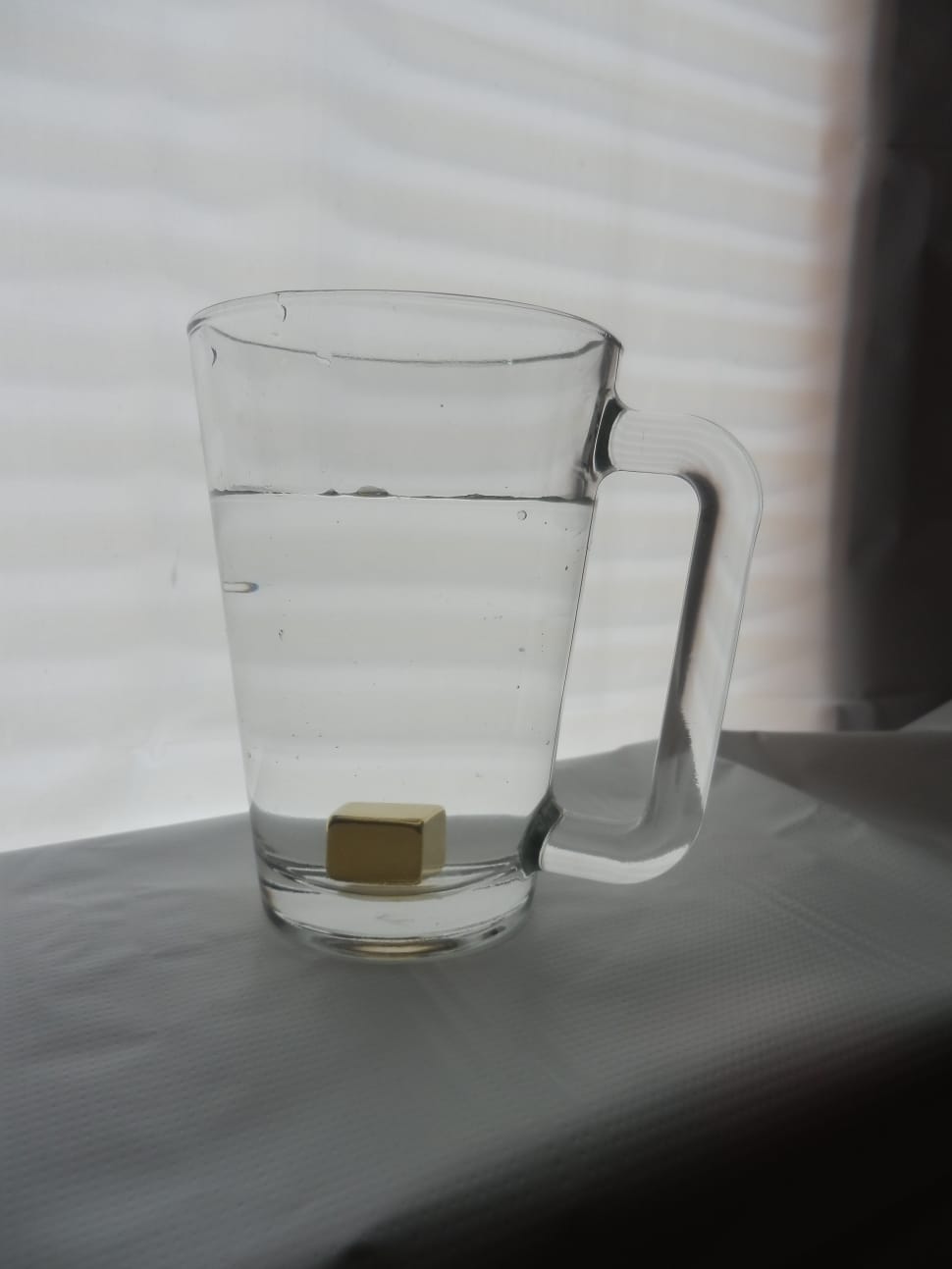 cube in clear glass drinking mug preview