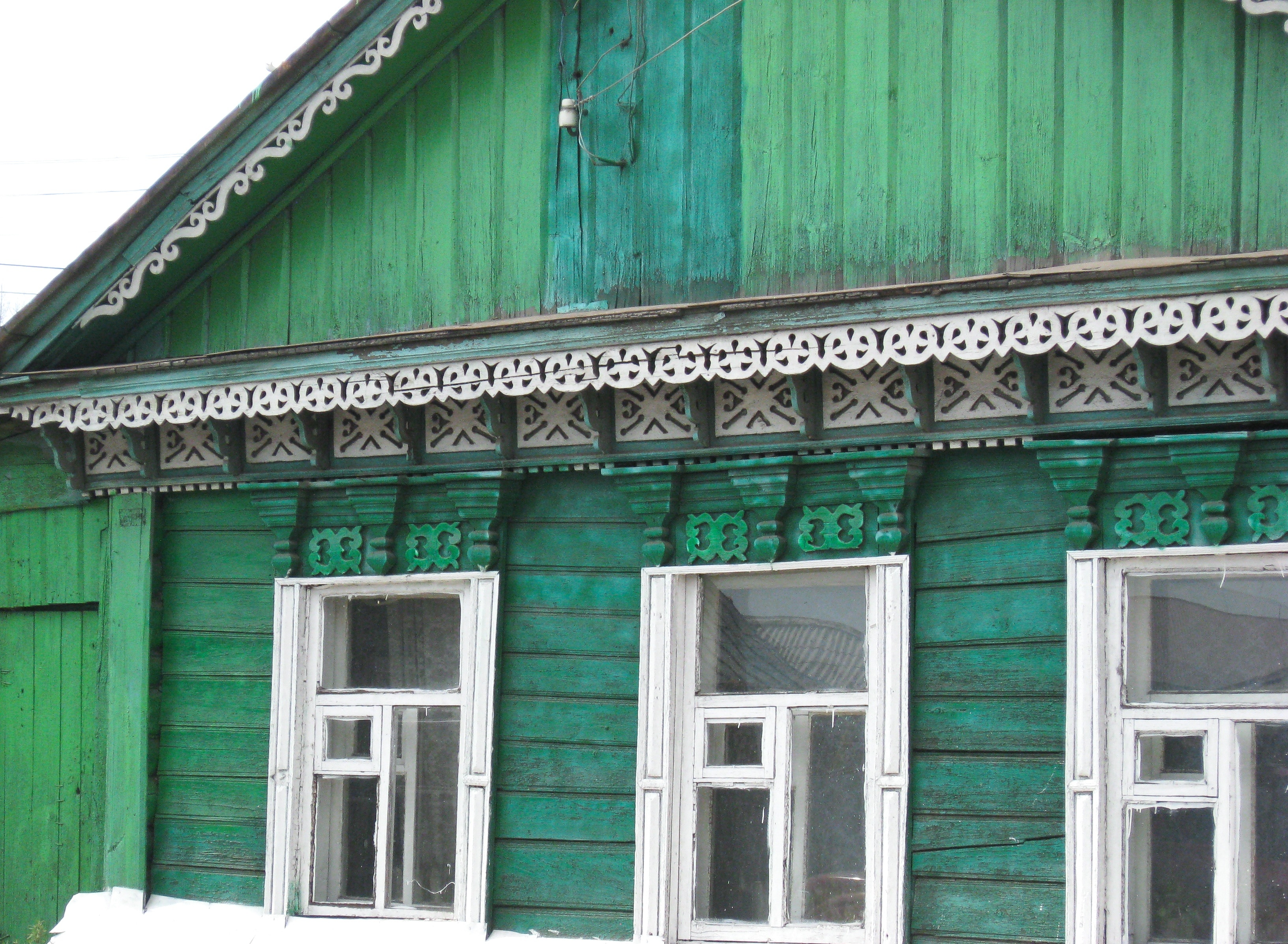 green and white painted house