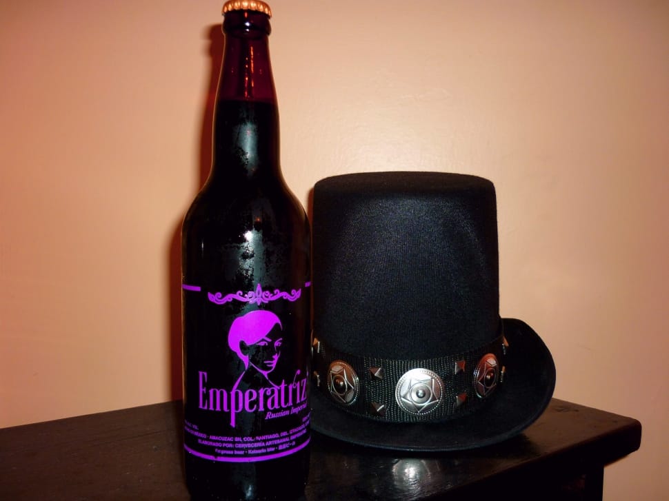 emperatriz bottle and black trilby hat preview