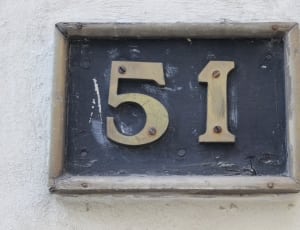 black and beige 51 wall number signage thumbnail