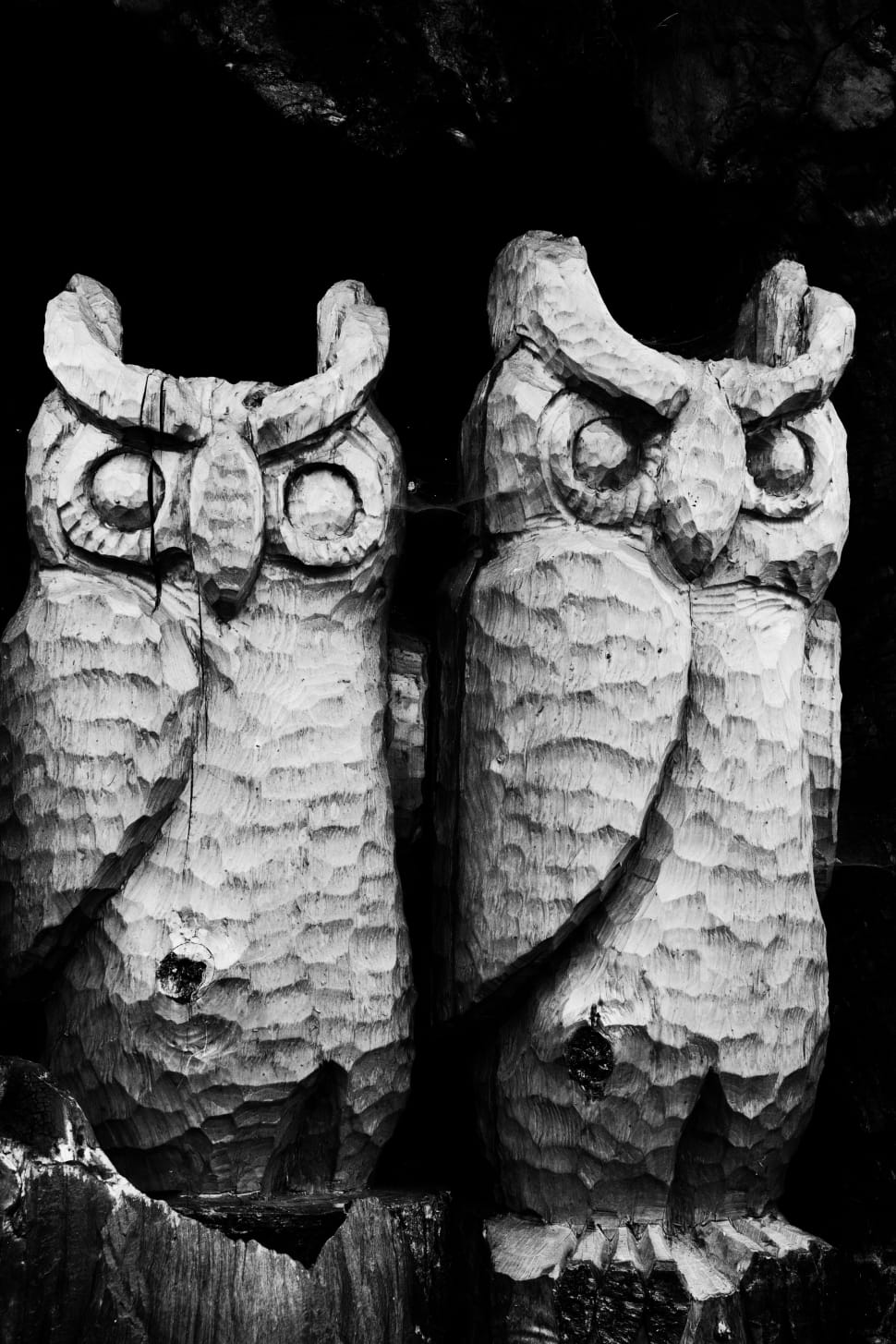 2 gray wooden owl sculptures preview