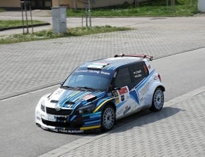 white and blue rally car thumbnail