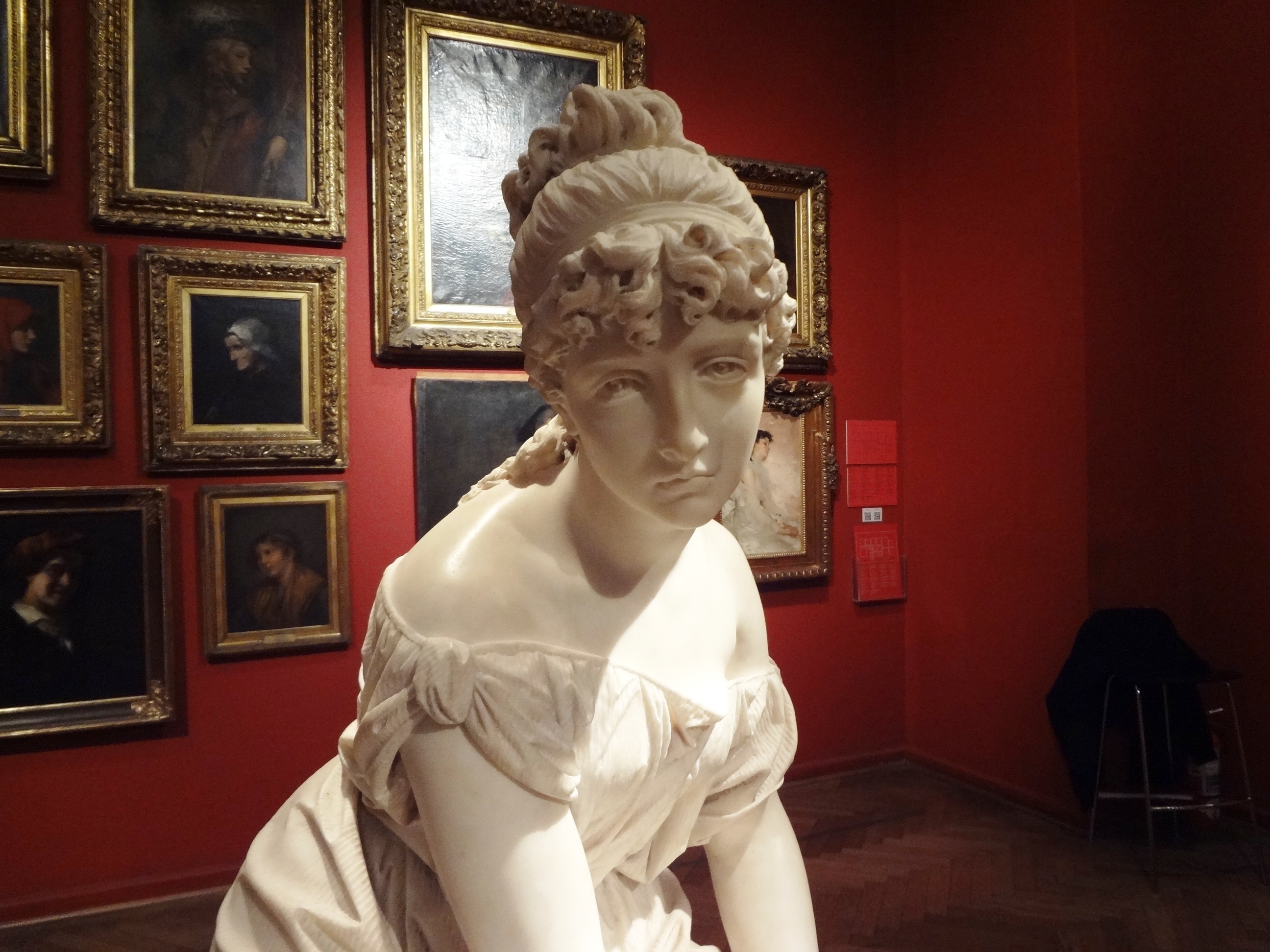 white woman in dress statue
