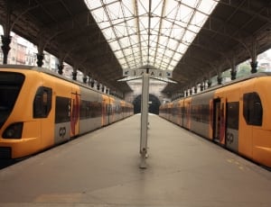 2 orange and gray trains thumbnail