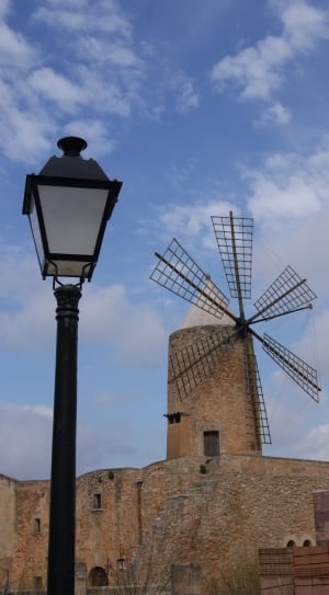 black post and brown concrete windmill thumbnail