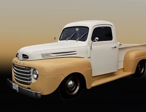 white and yellow classic single cab pickup truck thumbnail