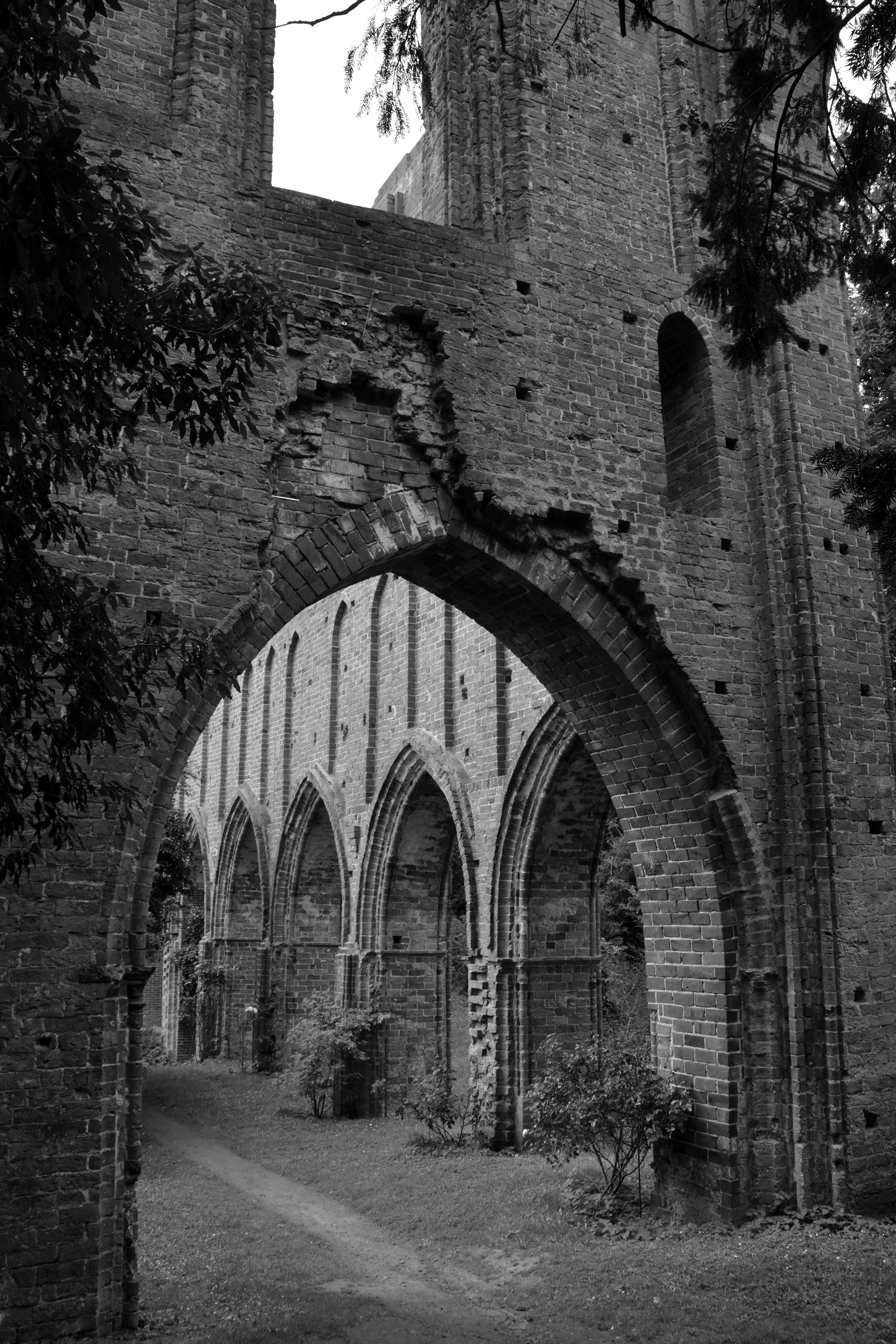 grayscale photo of brick temple