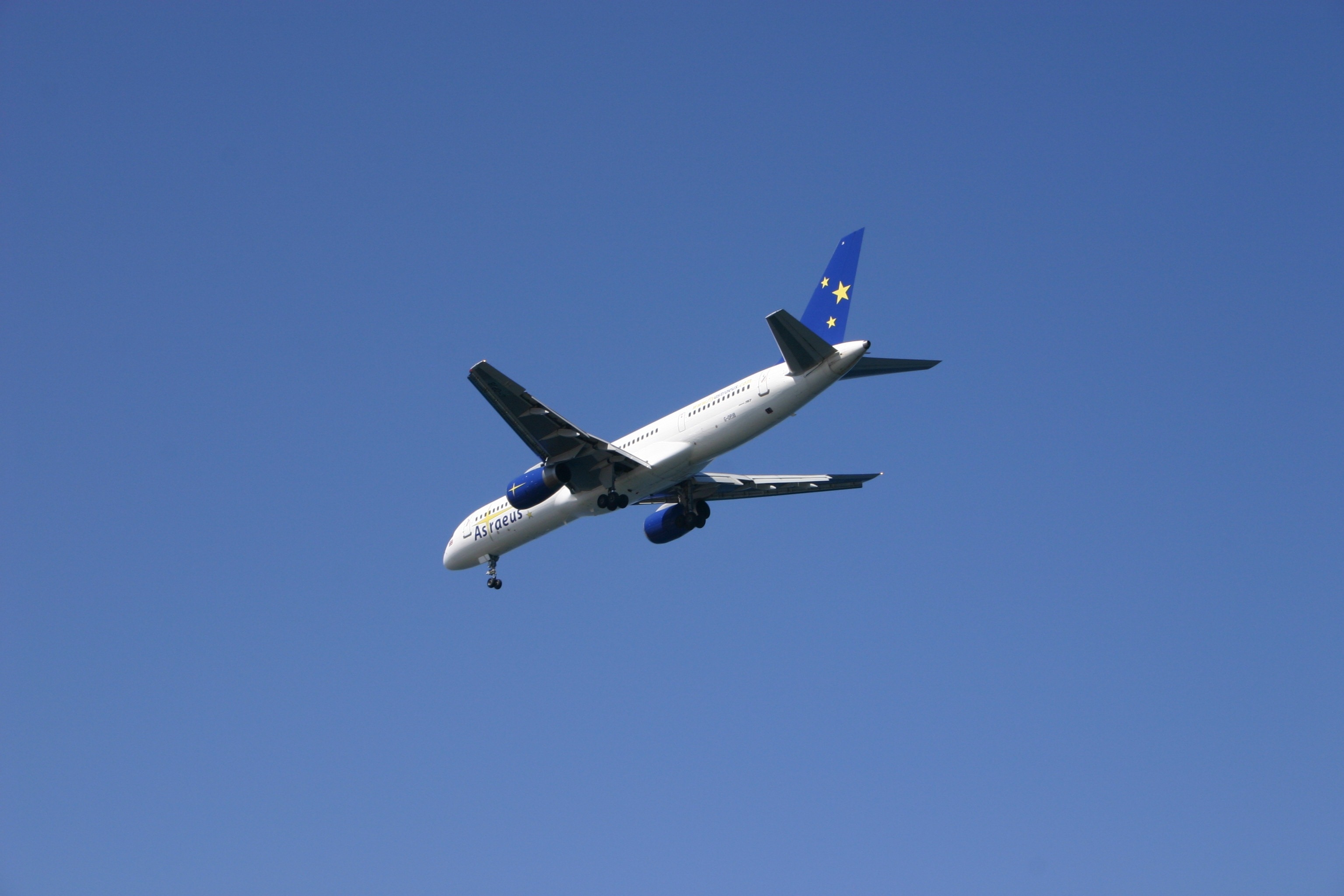 white and blue air plane