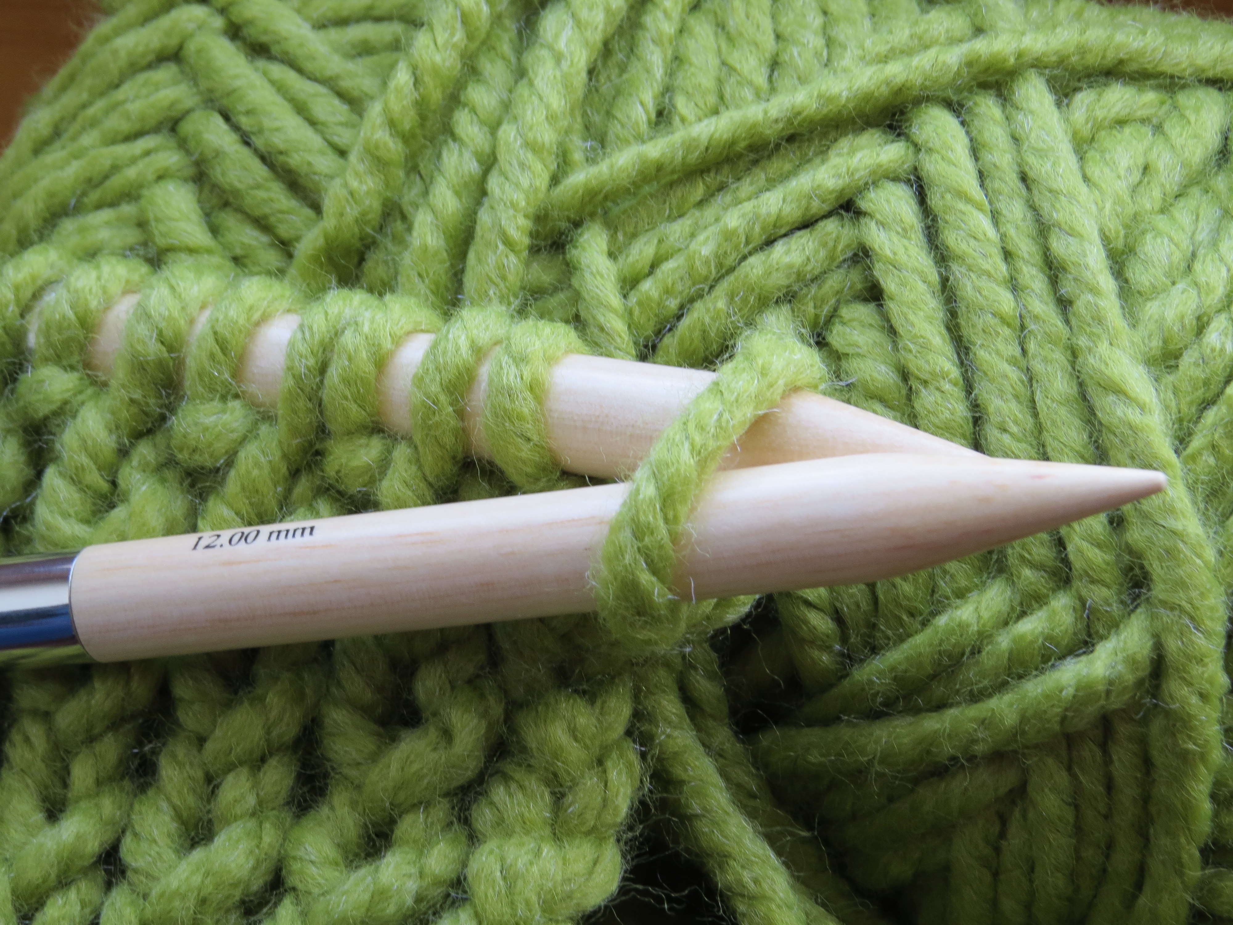 beige wooden knit stick