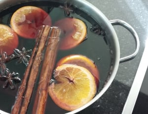 black liquid filled silver cooking pot thumbnail
