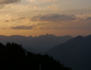 sunset photo of a mountain range thumbnail