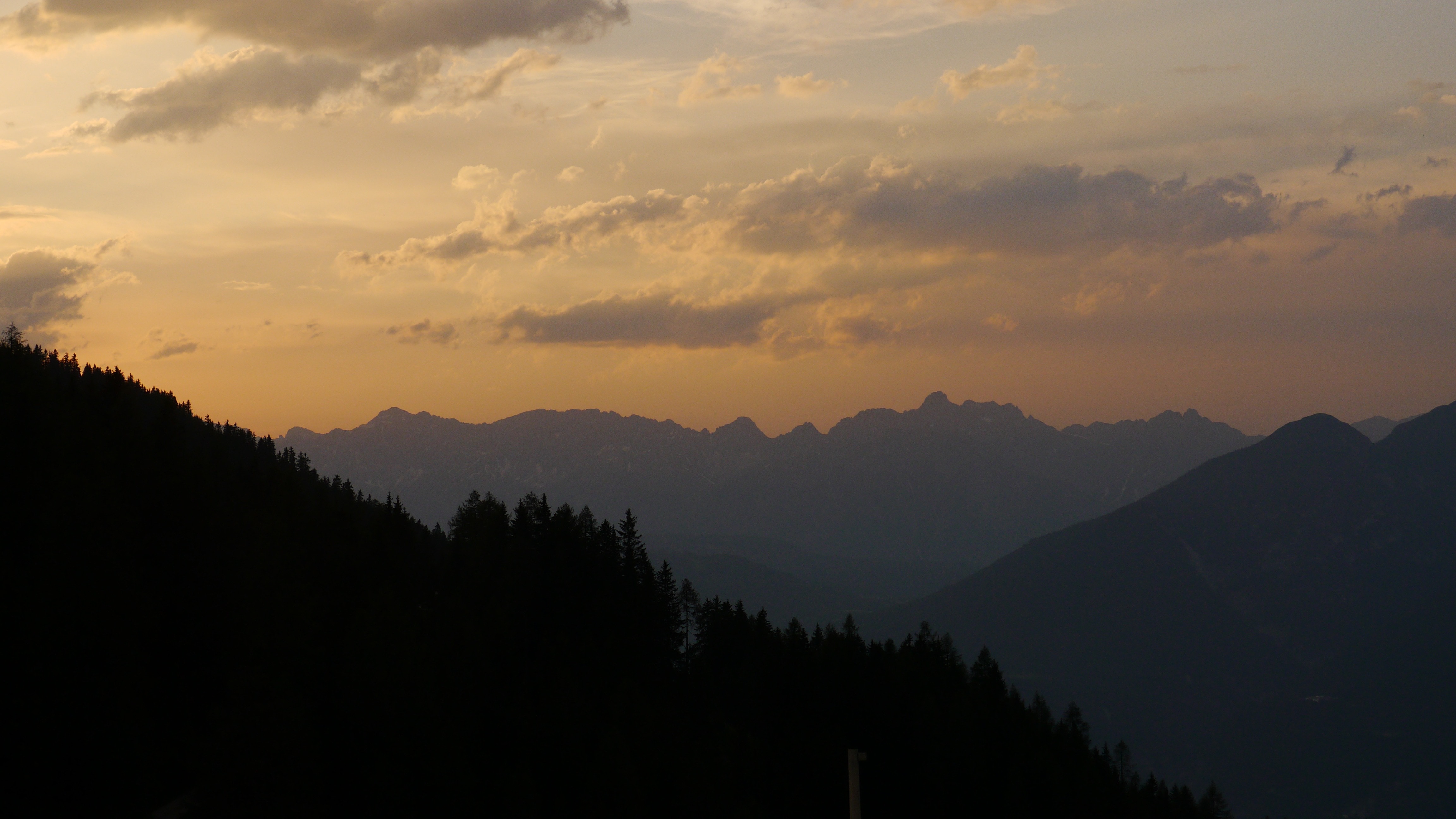 sunset photo of a mountain range
