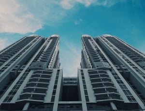 white high rise building under blue sky during daytime thumbnail