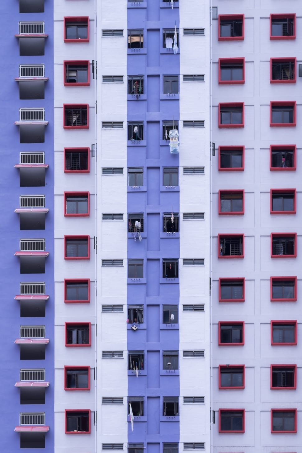 purple and white paint concrete high rise building preview