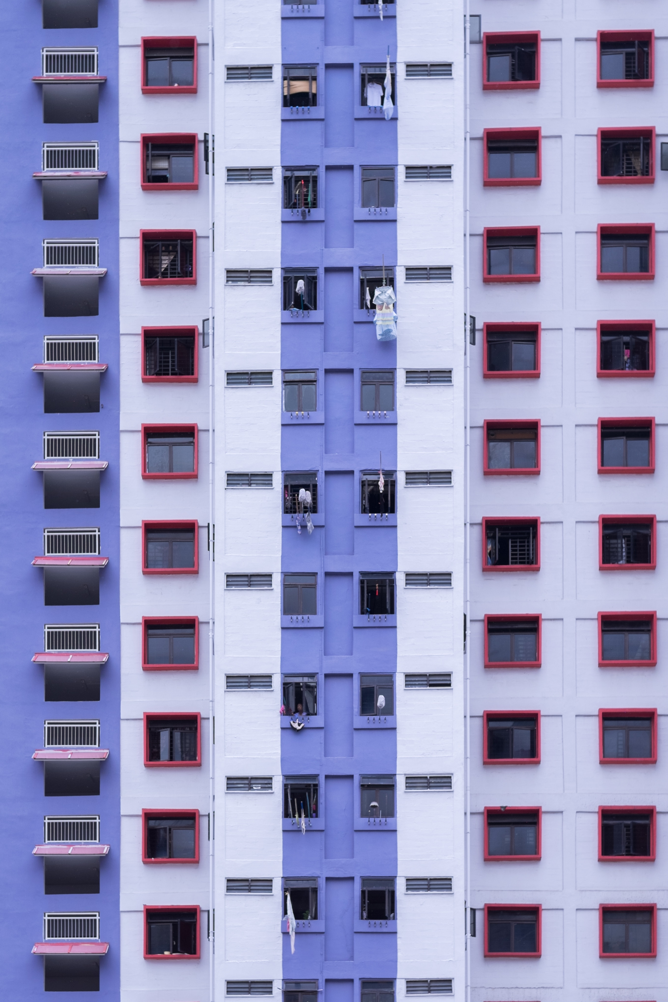 purple and white paint concrete high rise building