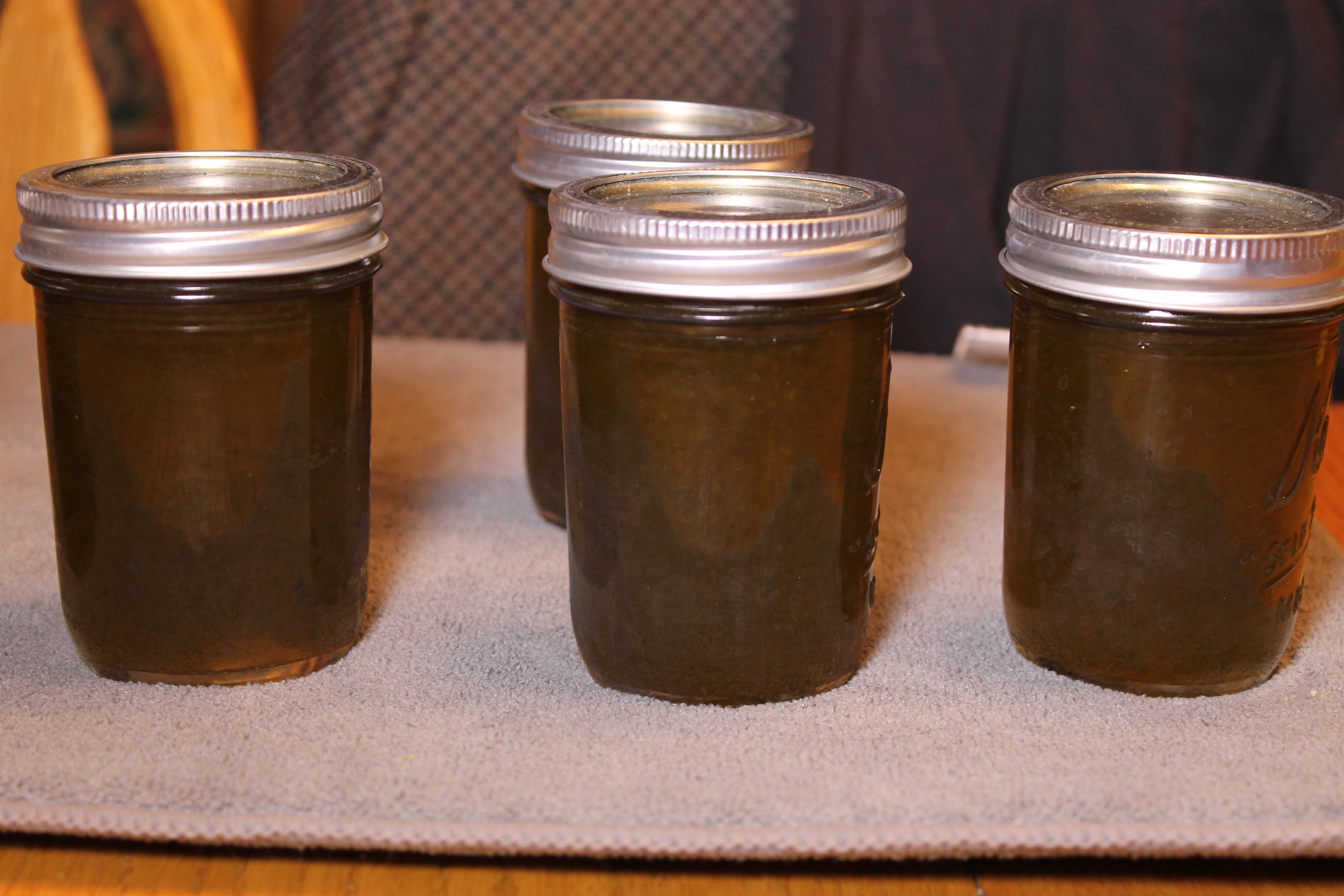4 black glass mason jars