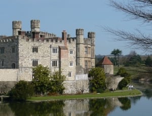 grey bricked castle with body of water thumbnail
