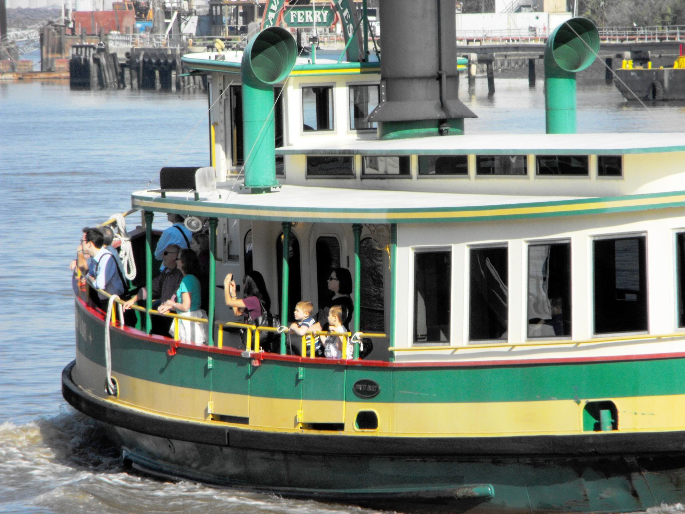 white yellow and green steam boat
