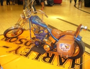 brown and blue cruiser motorcycle thumbnail
