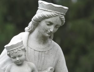 gray ceramic woman and baby decor thumbnail