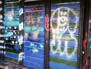 black, blue, and whit graffiti wooden wall thumbnail