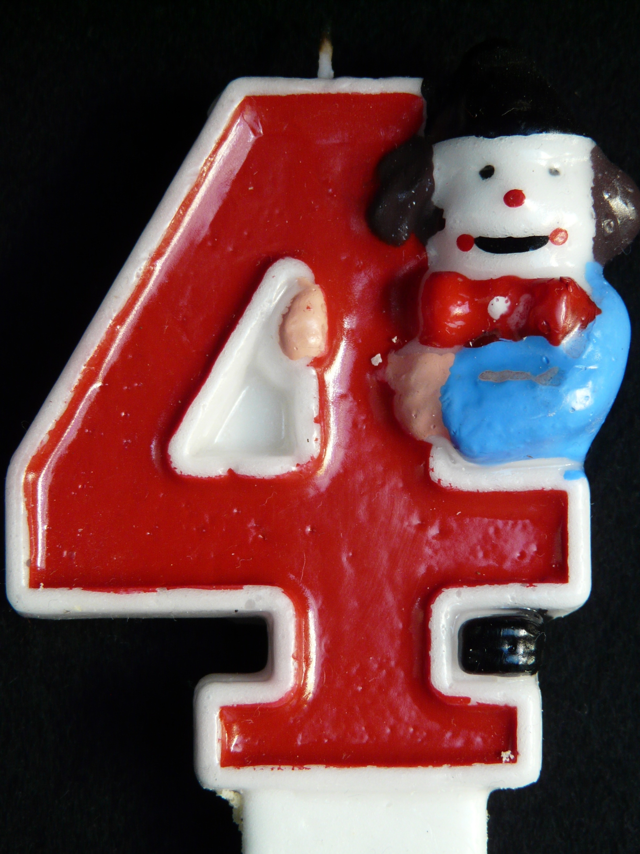 red and white snowman 4 birthday candle