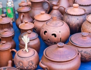 assorted brown ceramic pots thumbnail