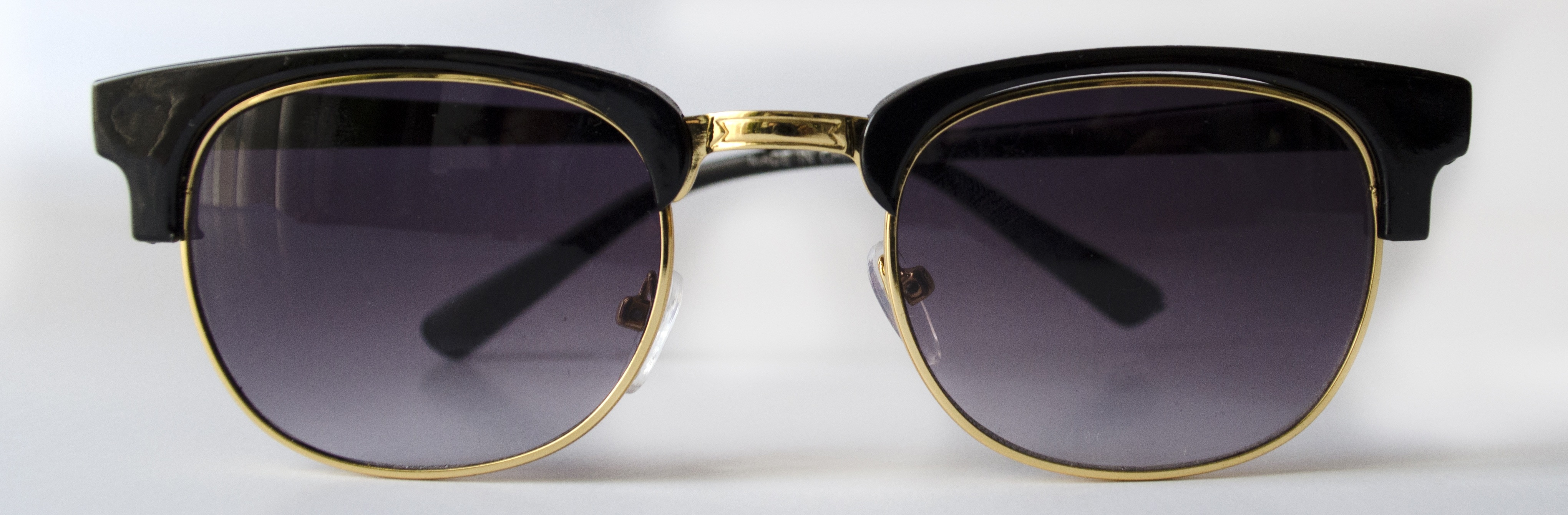 black clubmaster style sunglasses