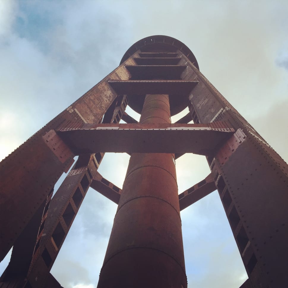 under-view photo of metal tower under nimbus clouds preview