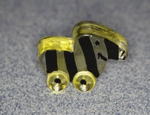 yellow and black plastic toy thumbnail