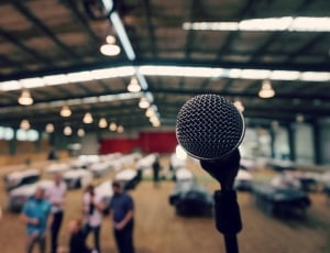 black microphone on selective focus photography thumbnail