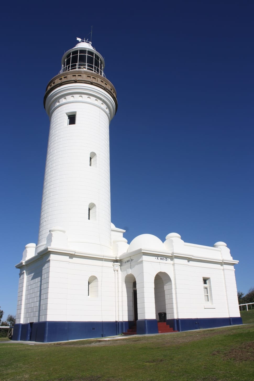 white and blue lighthouse preview